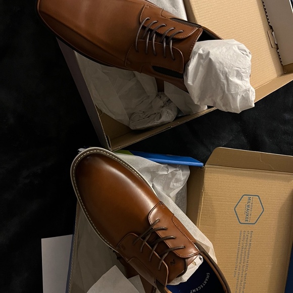 2 pairs of men’s 10.5 and 11 dress shoes never worn Unlisted and Nunn Bush
